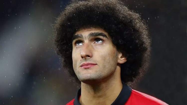 费莱尼最引人注目的就是他的蓬蓬头,走到哪都是焦点.