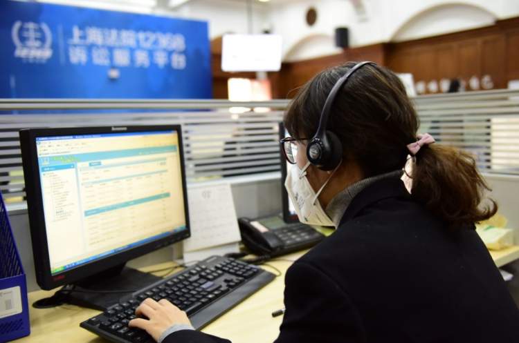 节后战疫首周上海法院12368坐席员忙得喉咙耳朵一起疼
